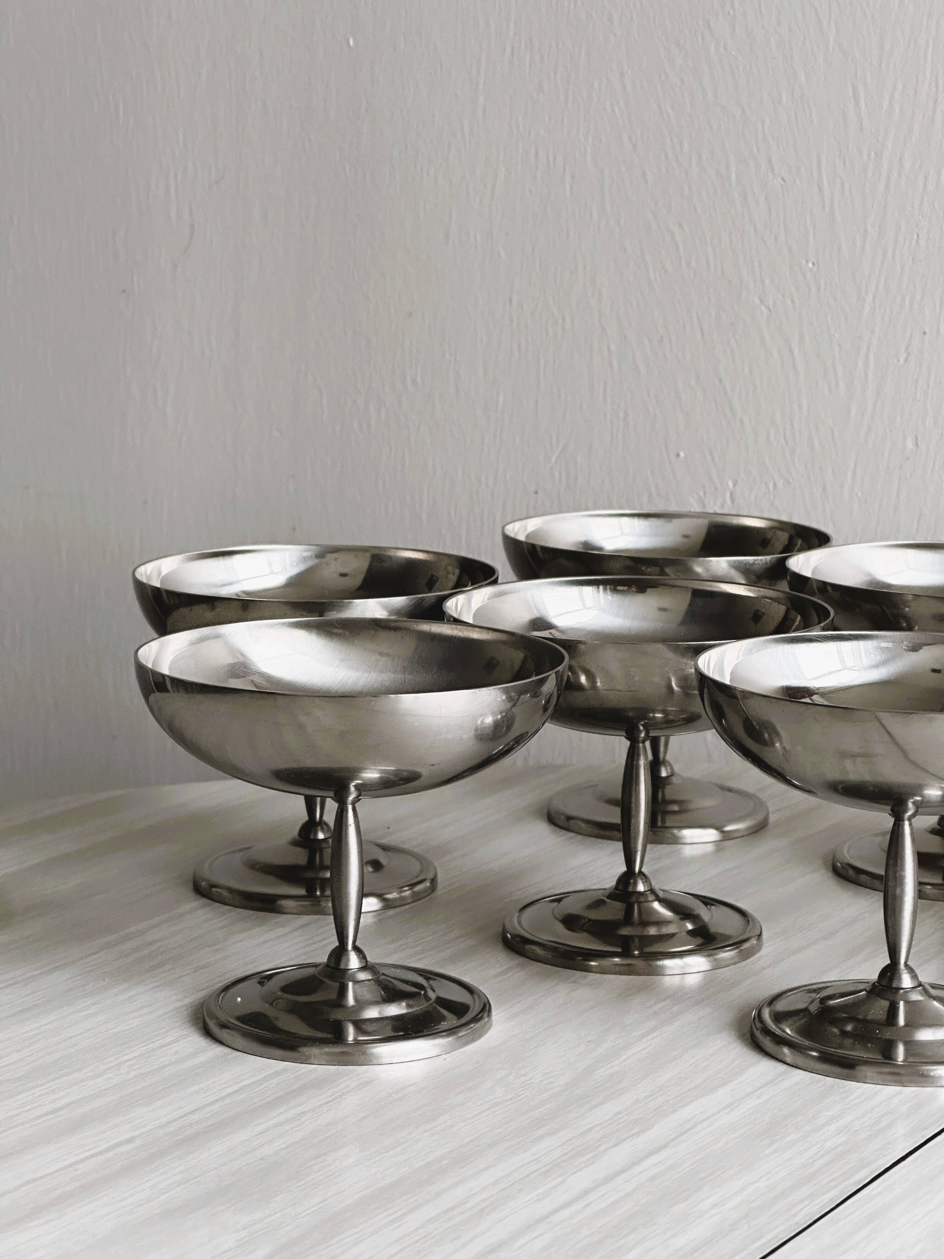 8 large stainless steel footed bowls Letang Remy