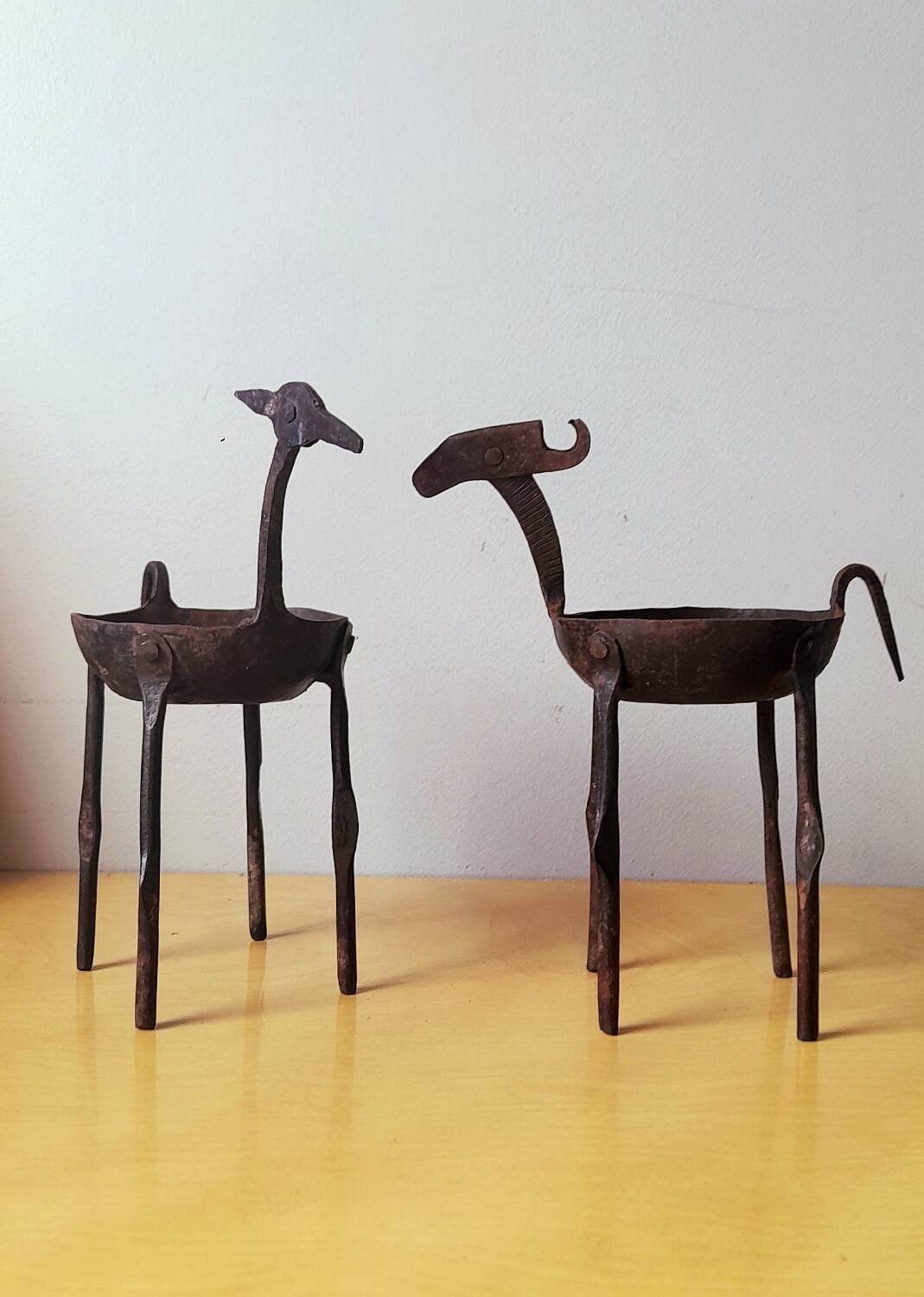 Zoomorphic wrought iron pocket emptier