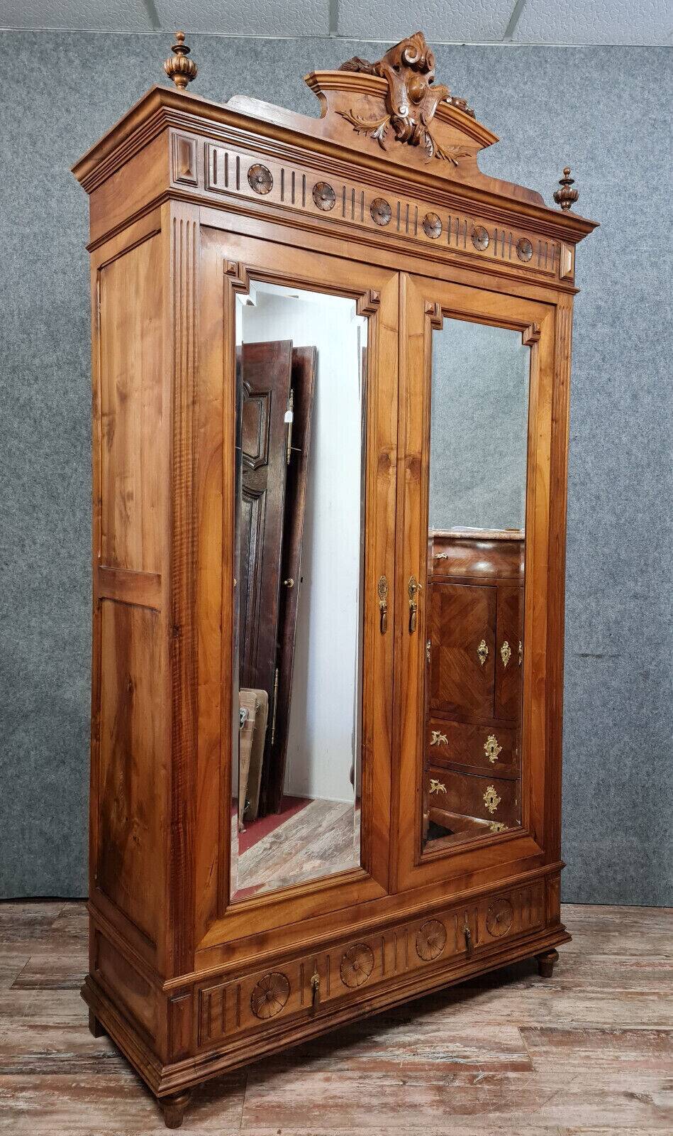 Louis XVI style wardrobe in walnut with blond patina circa 1880