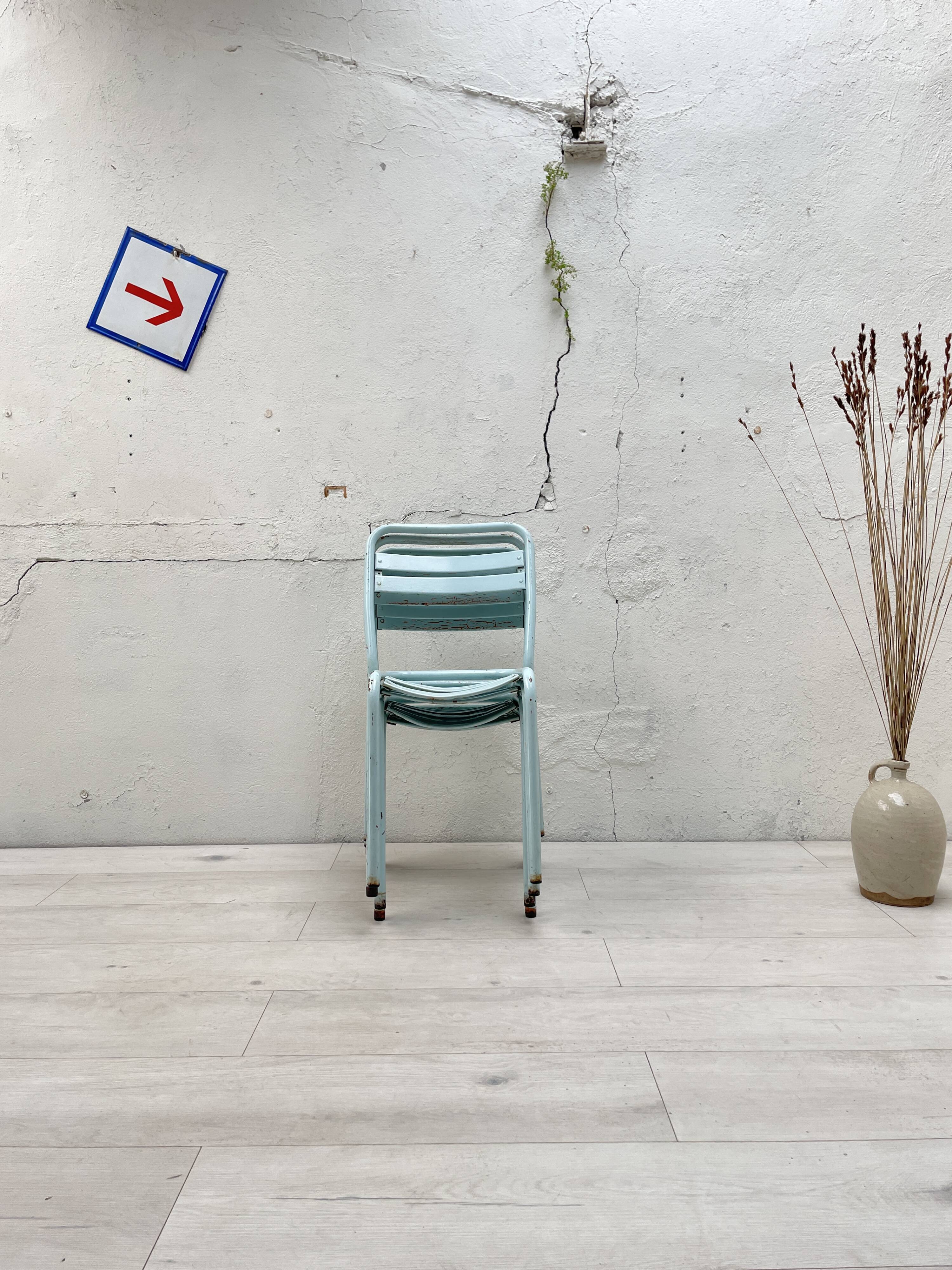 Set of four Tolix T2 chairs, circa 1950.