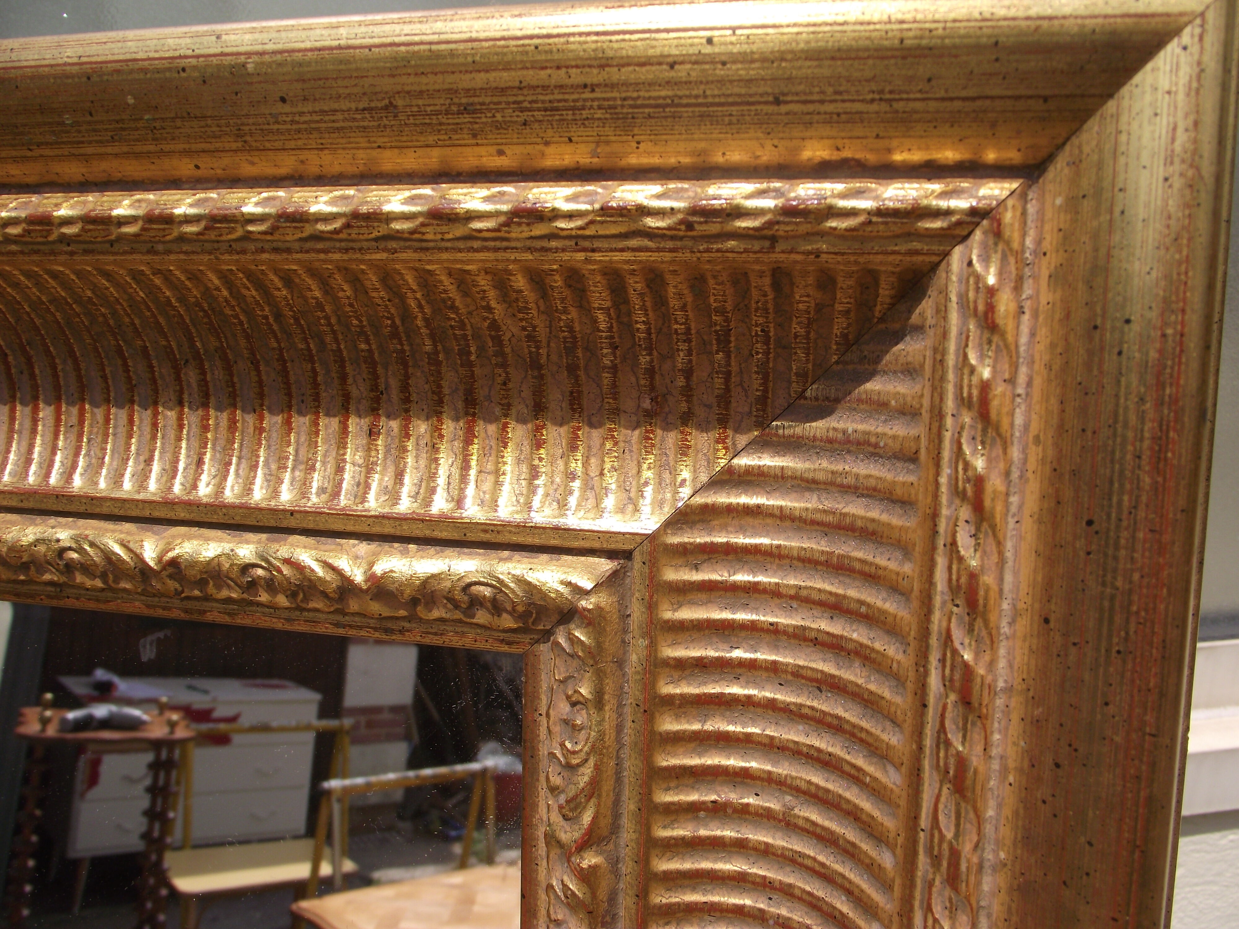 Mirror carved and gilded wood from the 80
