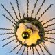 Spanish sunburst ceiling light – gilt iron rays & exposed bulb, 1960s