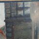 Oil on cardboard "The Street" signed and dated "Gillot 1918"