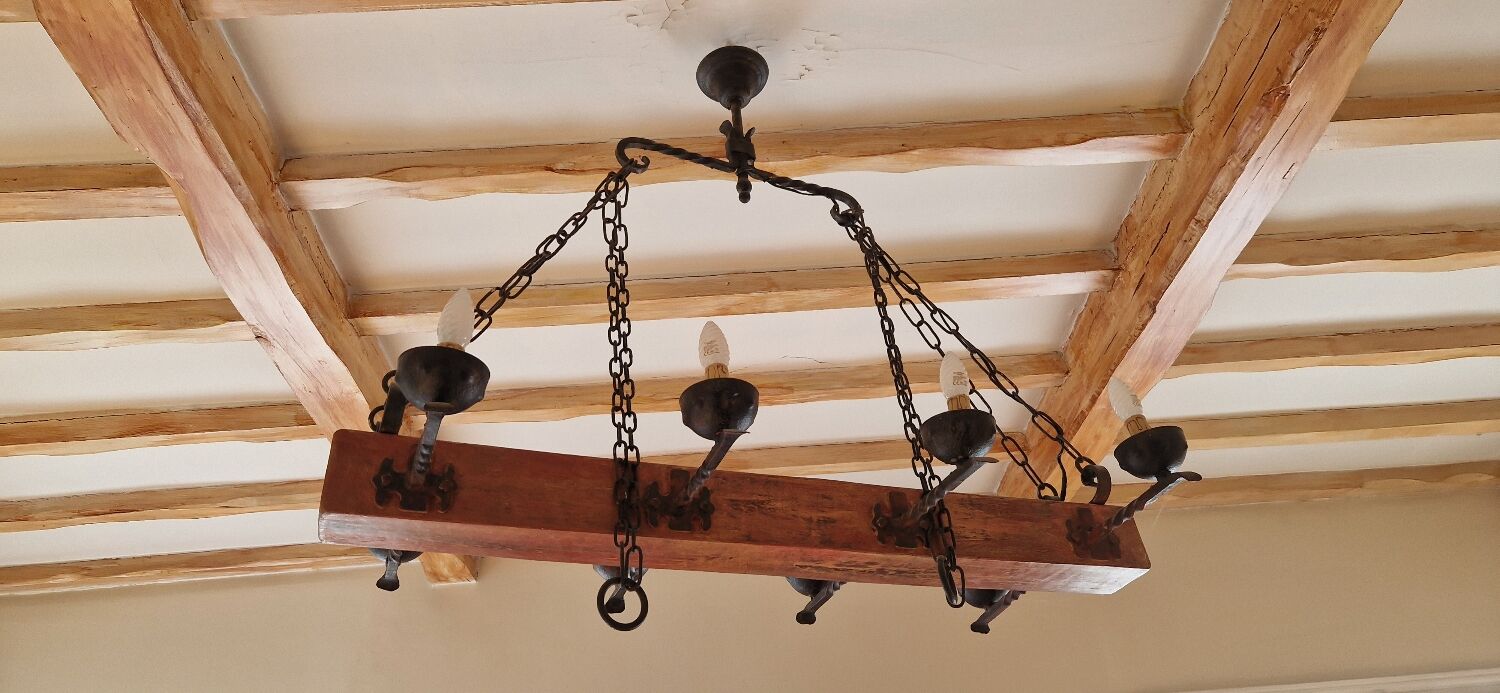 Wood and forged metal chandelier