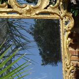 Miroir Louis XV bois doré à parecloses
