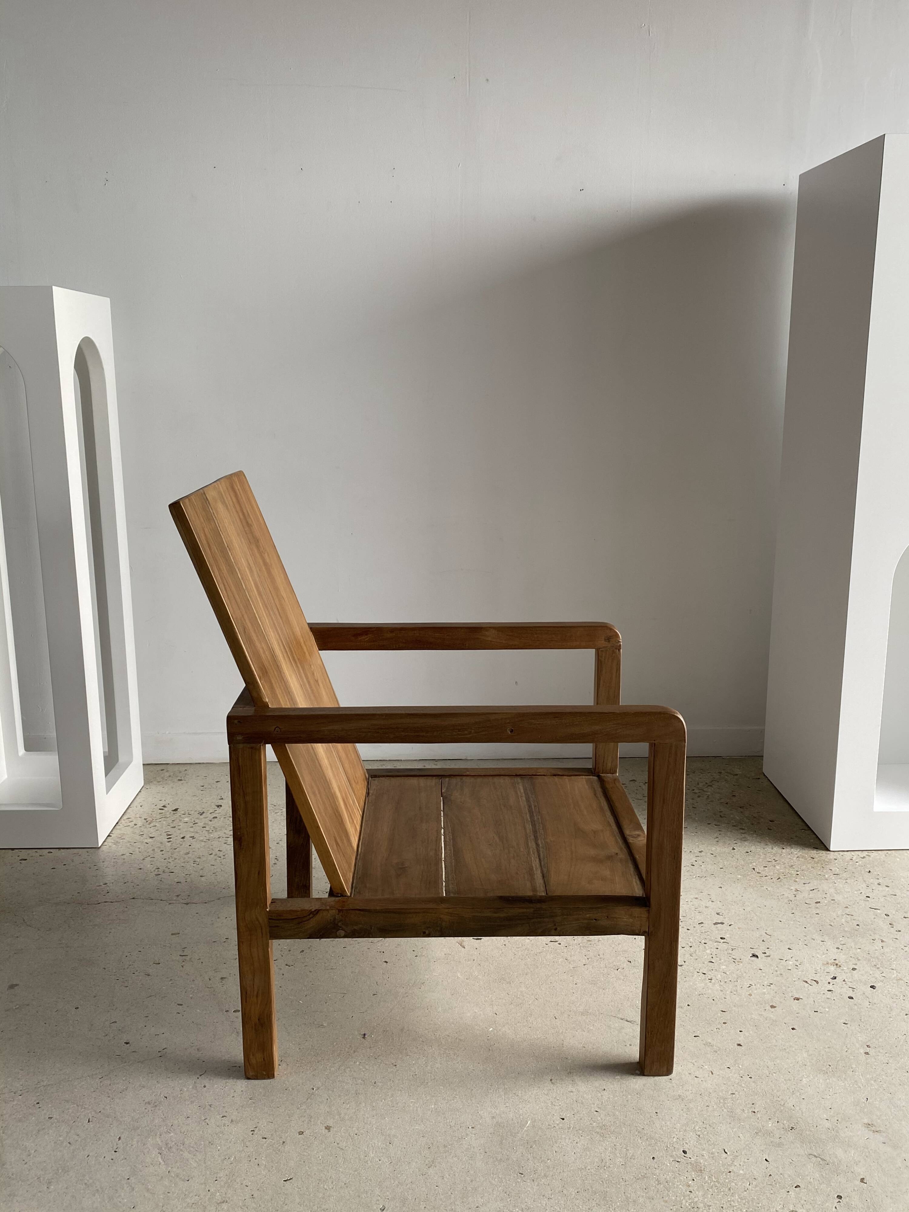 Armchair in natural wood (teak) minimalist design