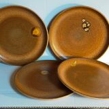 Quatre assiettes de potier en grès émaillé vintages