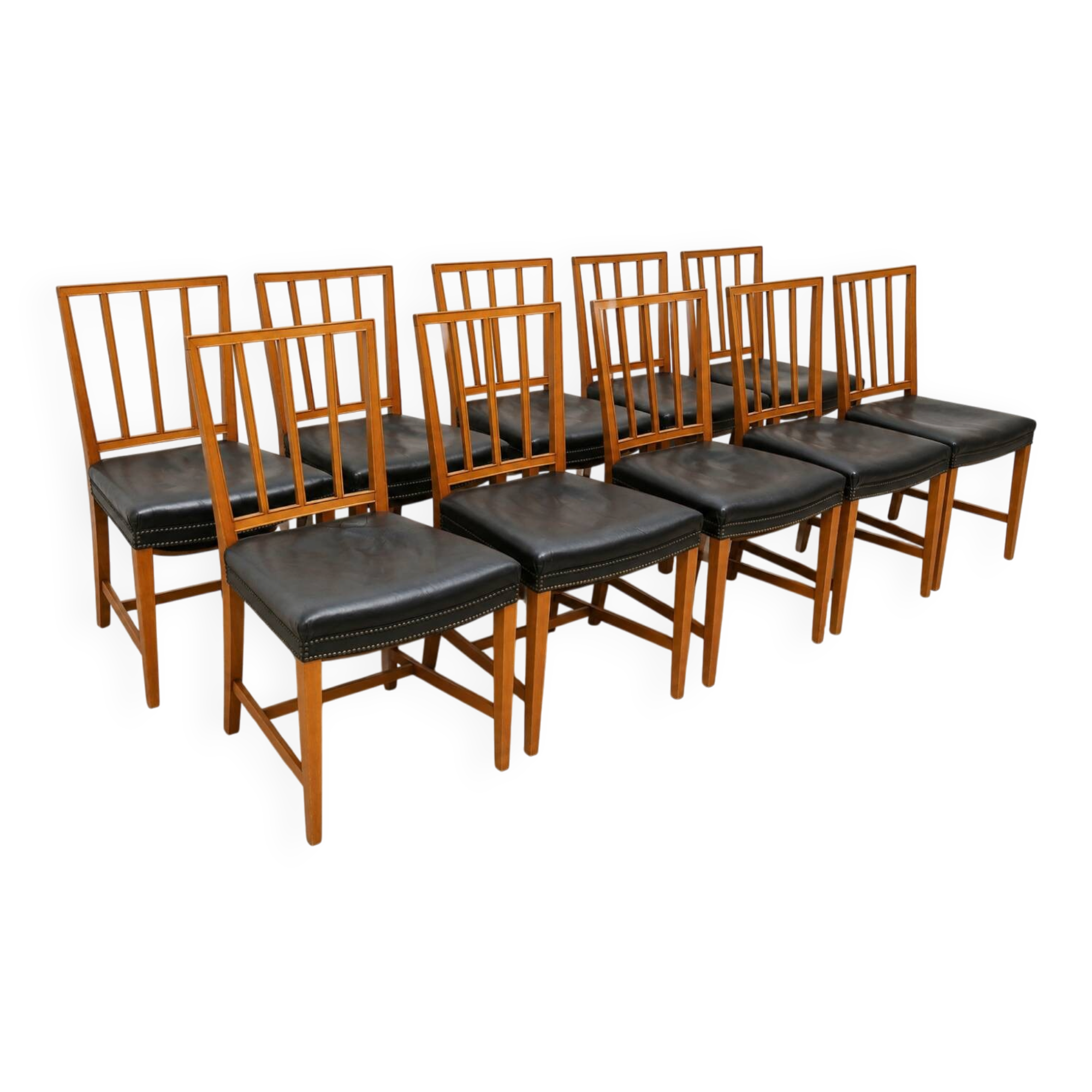 10 antique Josef Frank model 620 chairs in walnut wood from Svenskt Tenn.