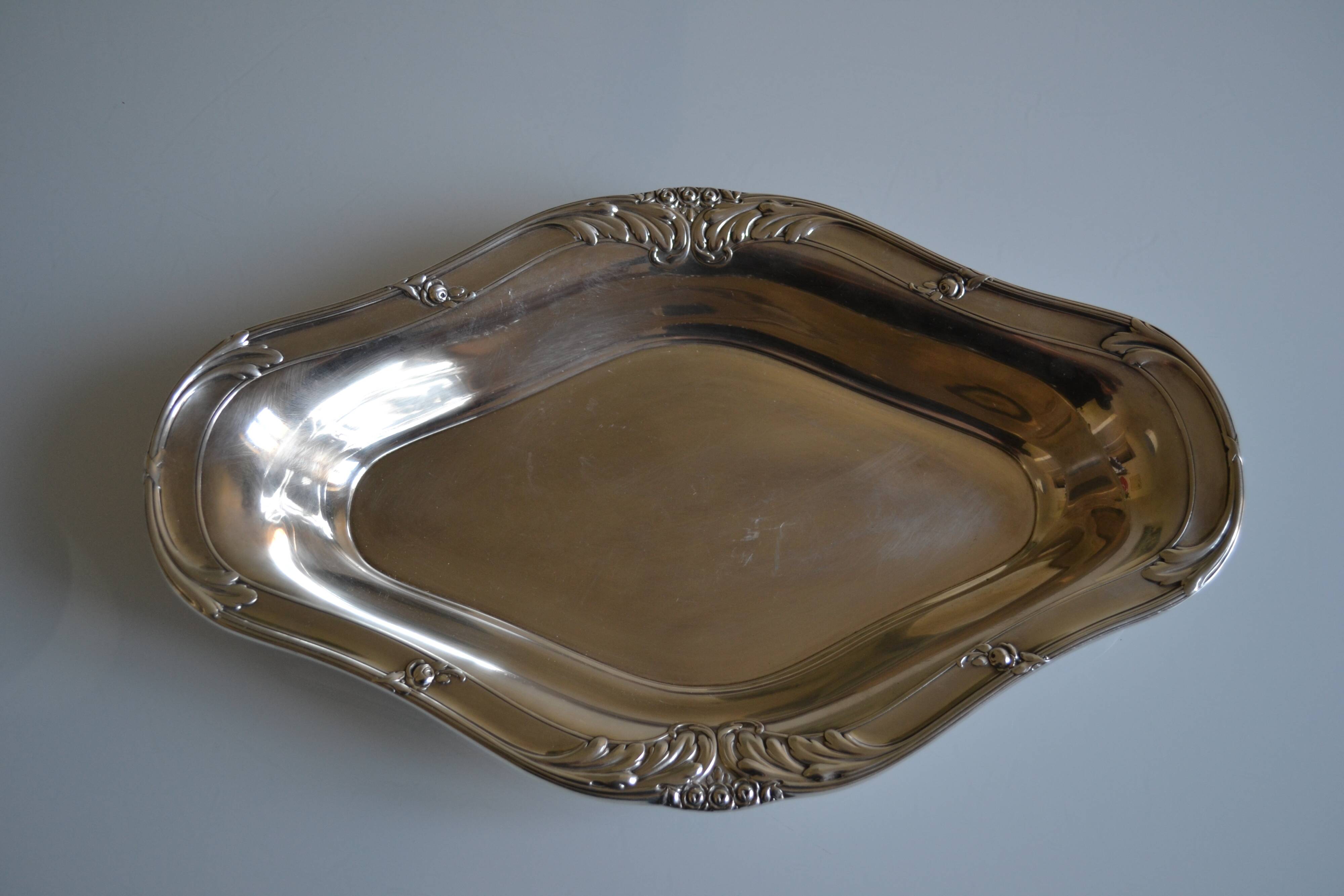 Flat basket cup in silver metal