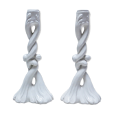 Pair of white ceramic candlesticks