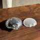 Vintage silver-plated shell butter dish with transparent bowl.