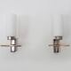 Pair of chrome-plated metal and opaline brass wall lights. 1960s