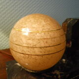Table lamp with pendulum