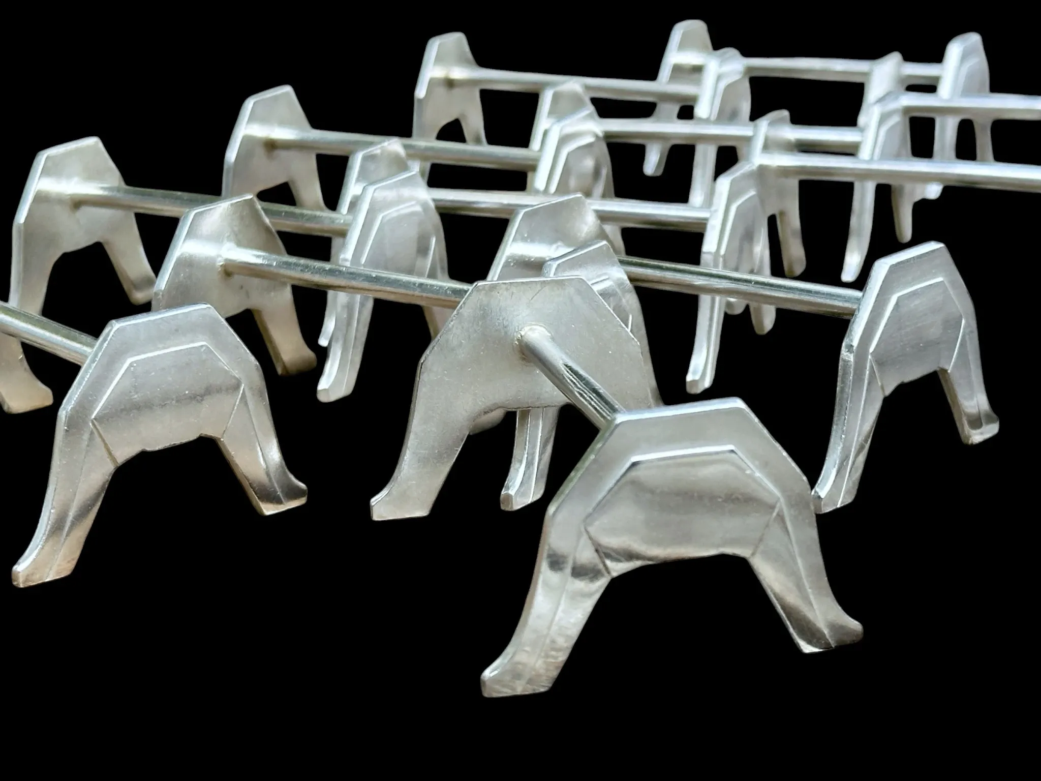 12 silver-plated metal knife rests by the silversmith Saglier, Arceaux Art Deco model.