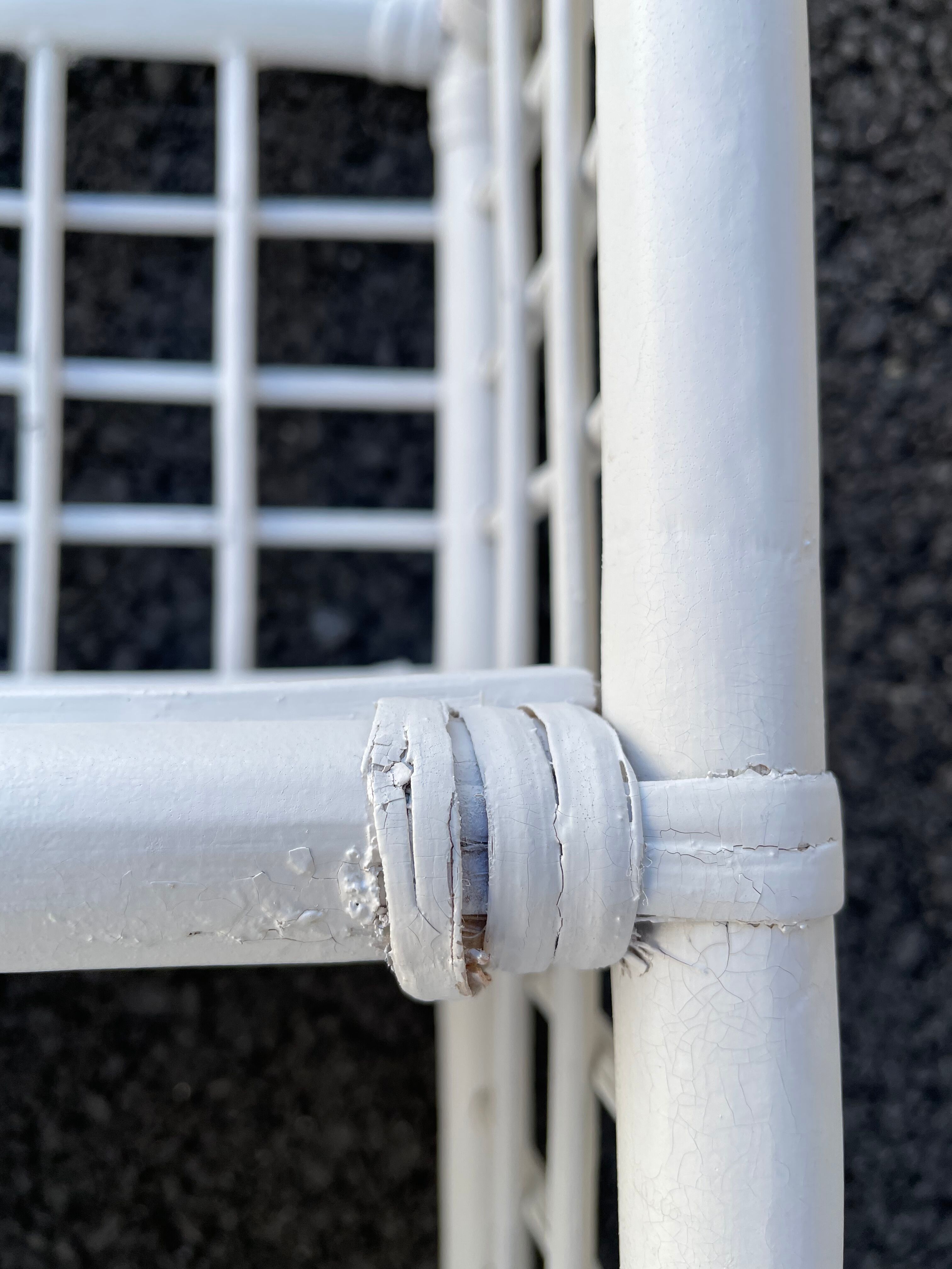 White rattan shelf with braces