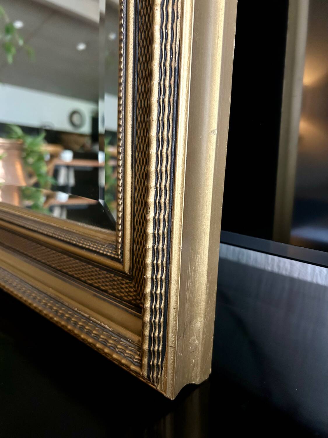 Large antique beveled mirror in the Napoleon III style - Gold and black frame