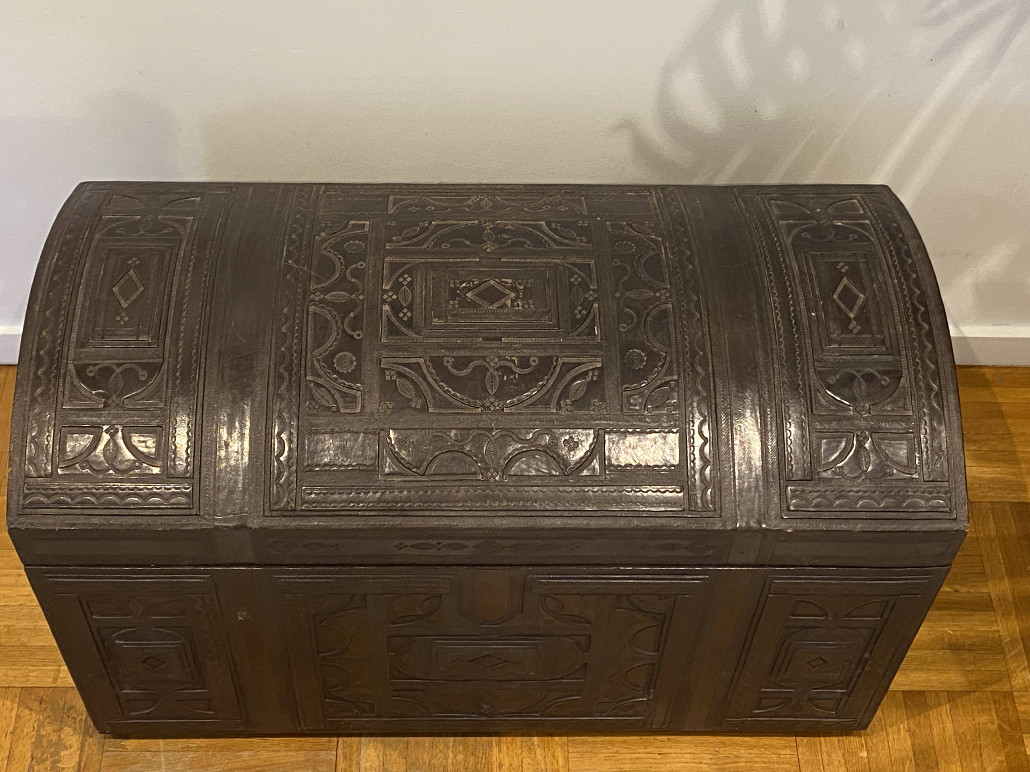 Brown leather and wood domed chest