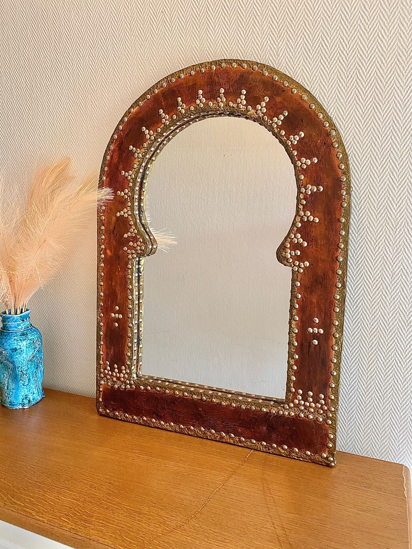 Large vintage mirror in studded leather and brass