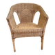 Rattan and woven wicker armchair in vintage bohemian style