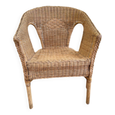 Rattan and woven wicker armchair in vintage bohemian style