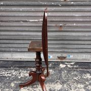 19th-century solid mahogany table with a tilting top and brass mechanism.