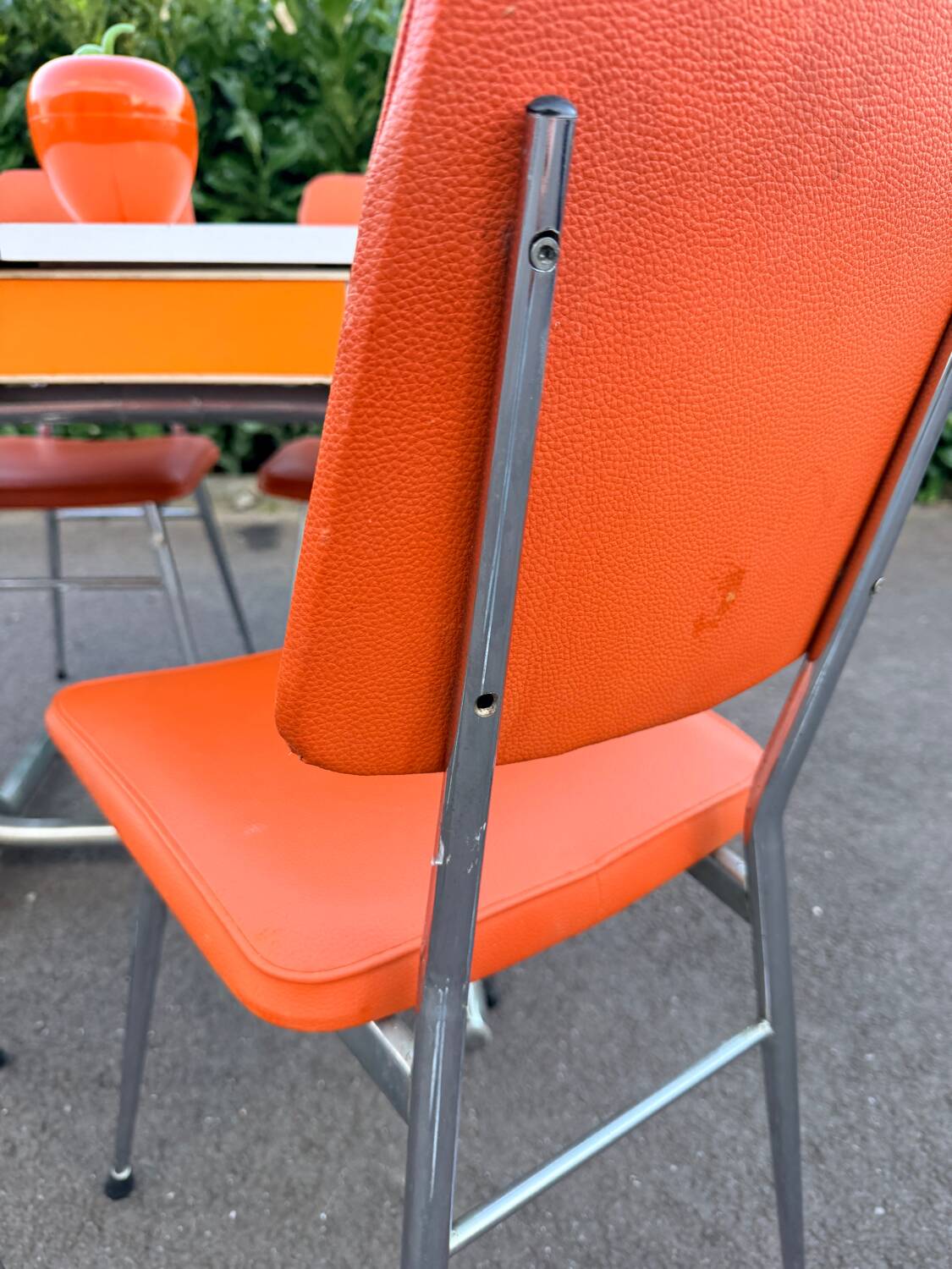 Formica leatherette chair with orange table, vintage 70s Space Age