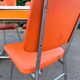 Formica leatherette chair with orange table, vintage 70s Space Age