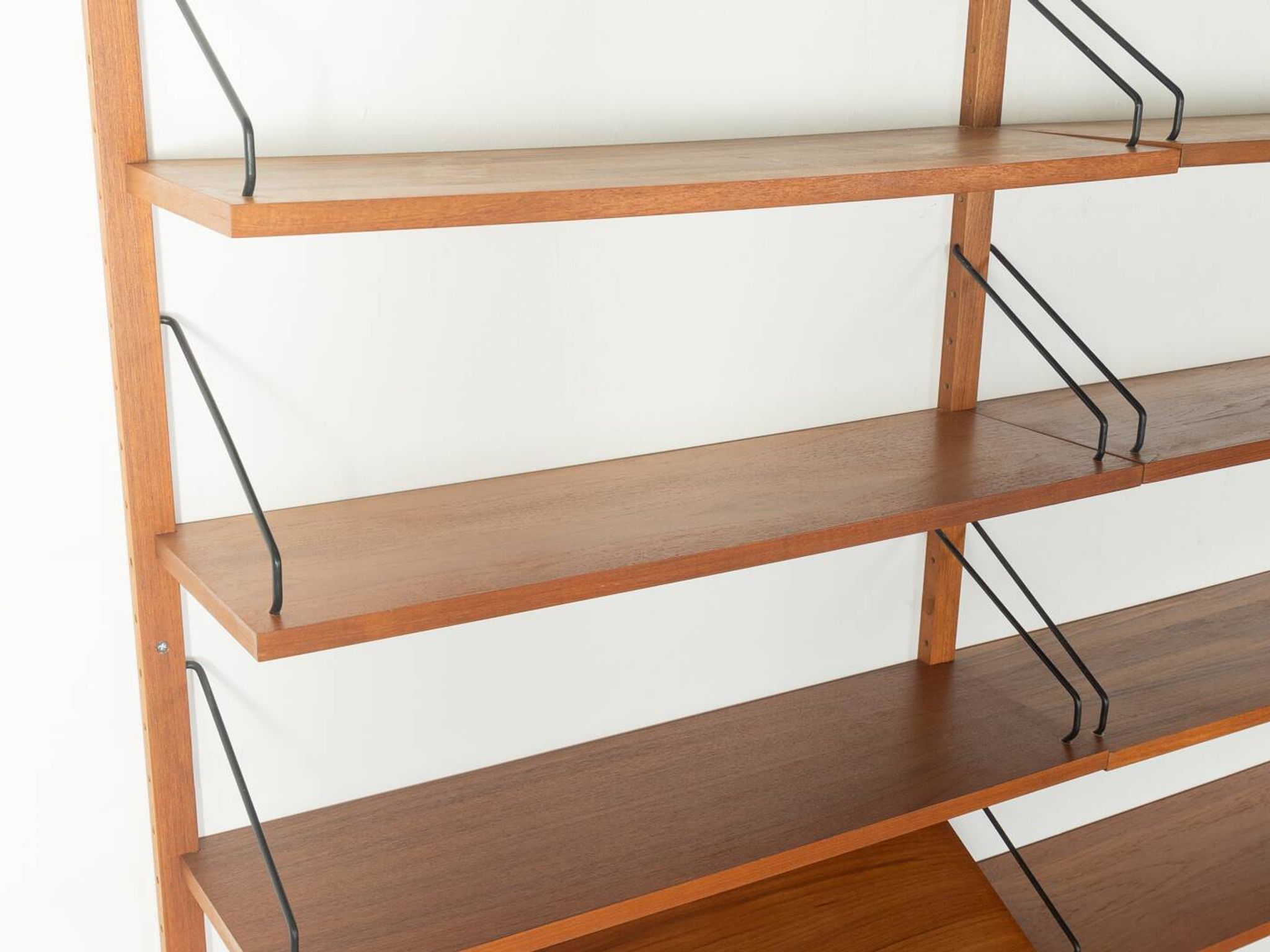 Classic shelving system from the 1960s in teak veneer by Poul Cadovius for Cado