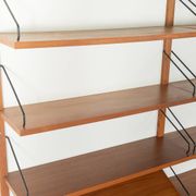 Classic shelving system from the 1960s in teak veneer by Poul Cadovius for Cado