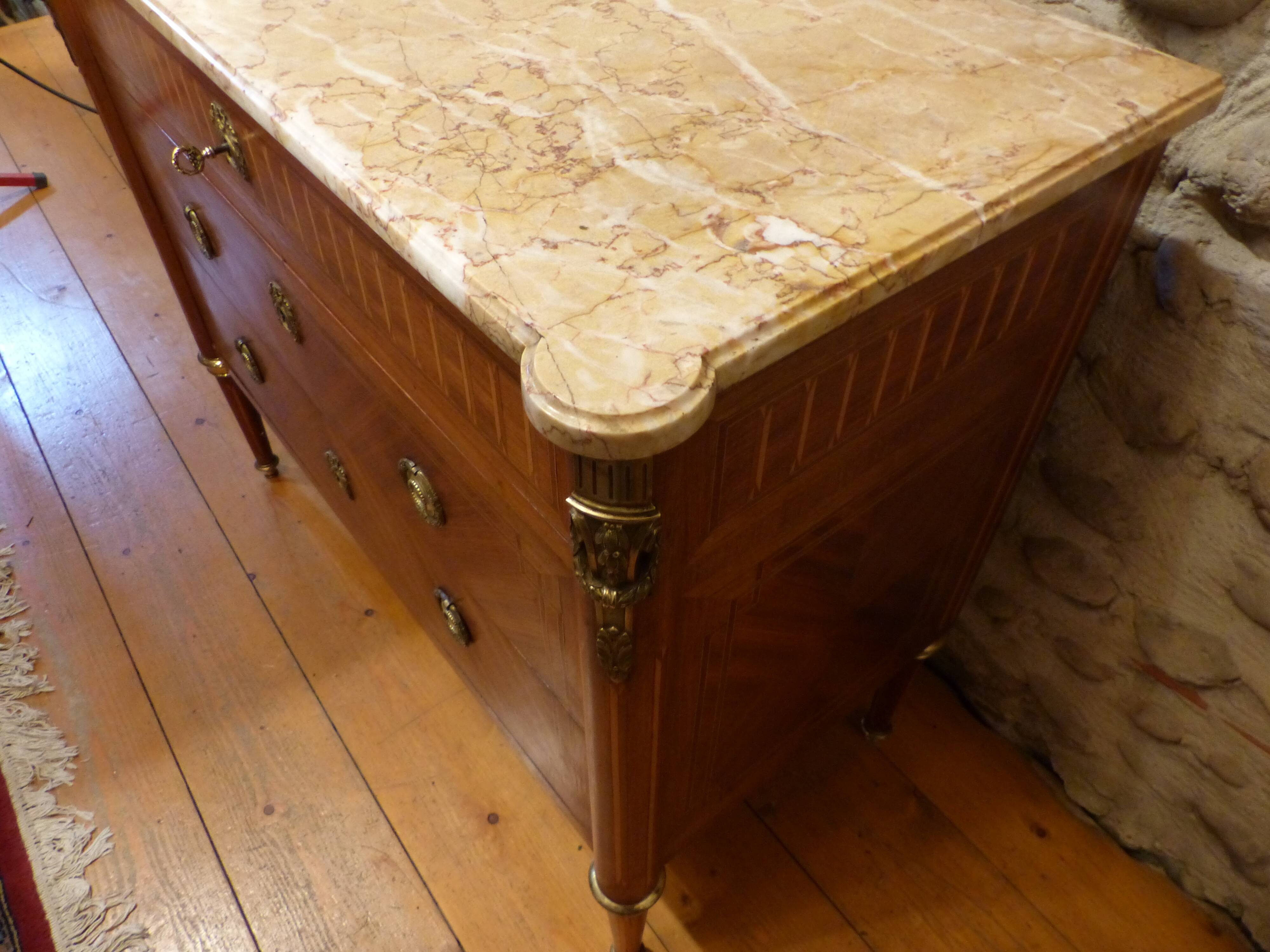 Louis XVI-style dresser marked on marble