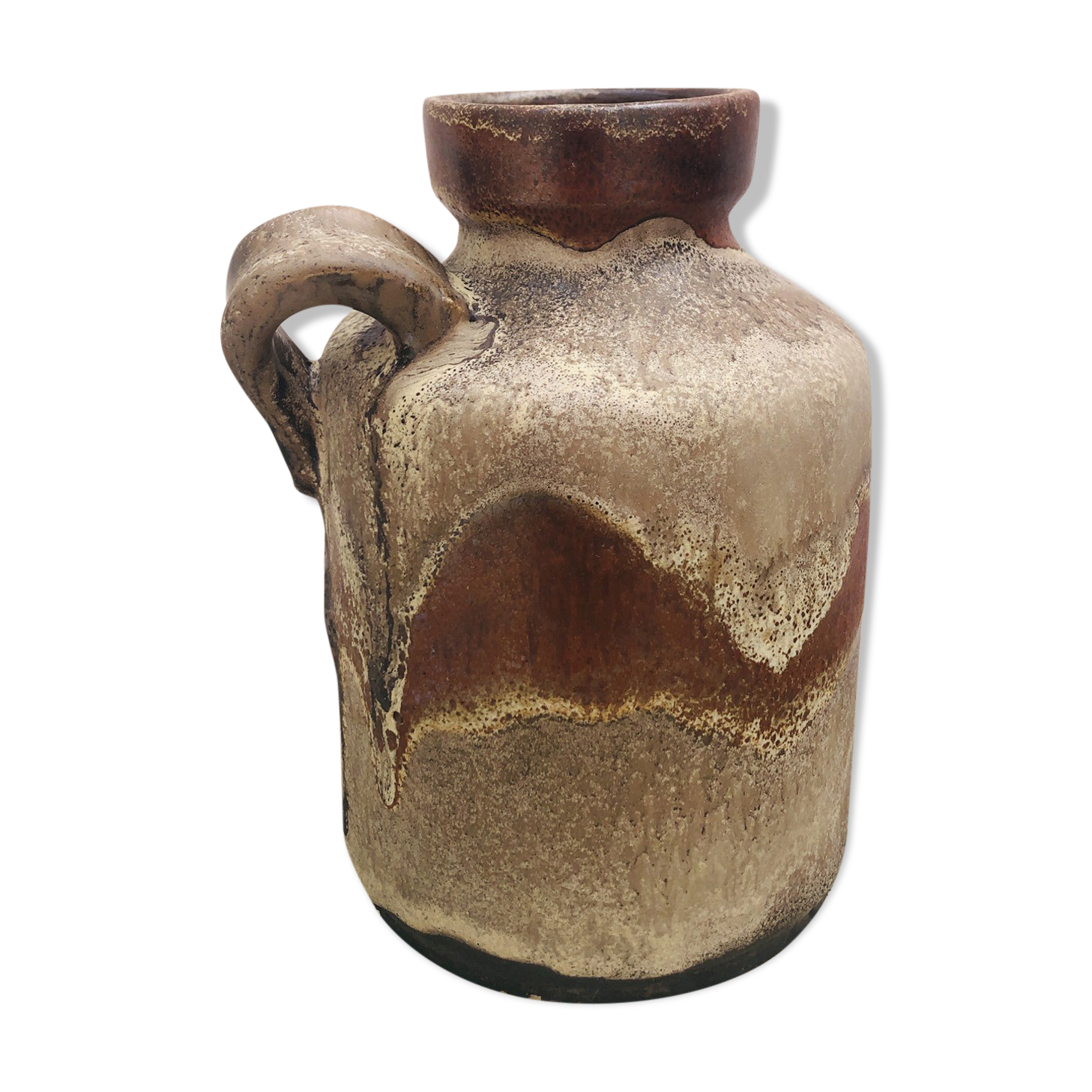 Ancient sided jug in flamed sandstone