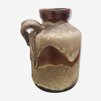 Ancient sided jug in flamed sandstone