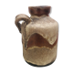 Ancient sided jug in flamed sandstone