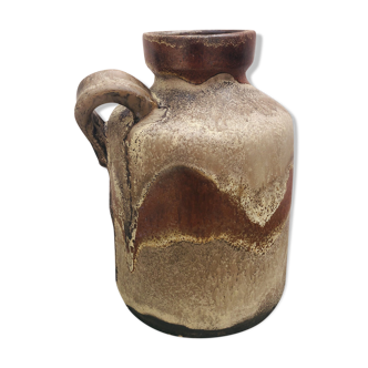 Ancient sided jug in flamed sandstone