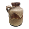 Ancient sided jug in flamed sandstone