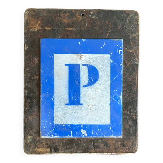 Letter P on metal plate