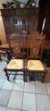 Breton dining room table with 2 extensions and 6 chairs with carved Breton characters