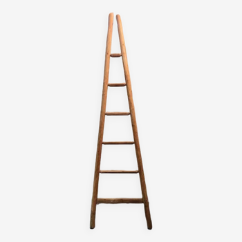 Wooden triangular ladder
