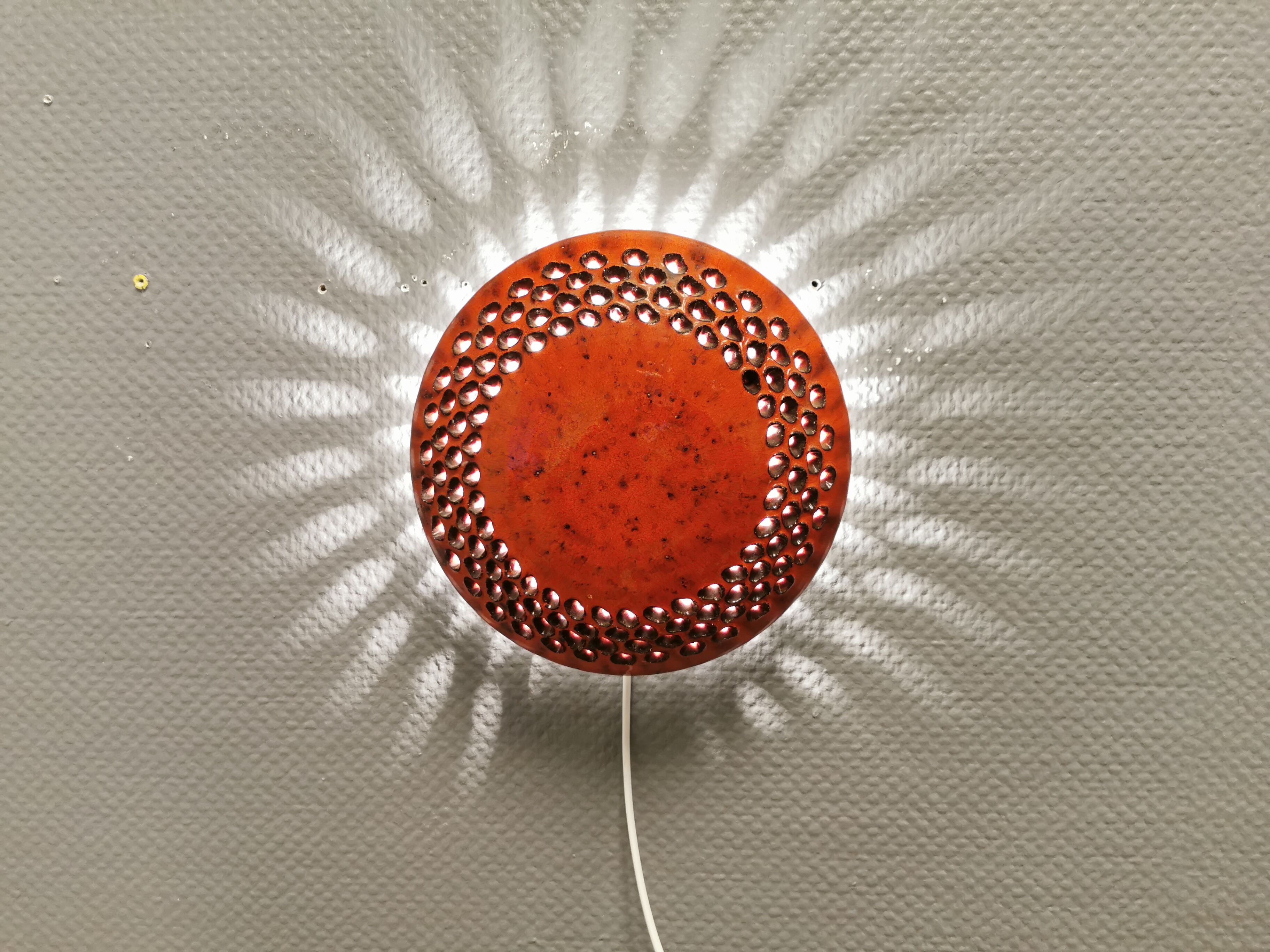 Danish ceramic wall lamp, in nice red glaze. From the 1960s