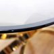 Italian coffee table in smoked glass and brass