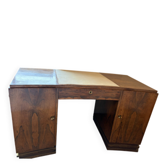 Art Deco desk in a boomerang shape with English-style drawers.