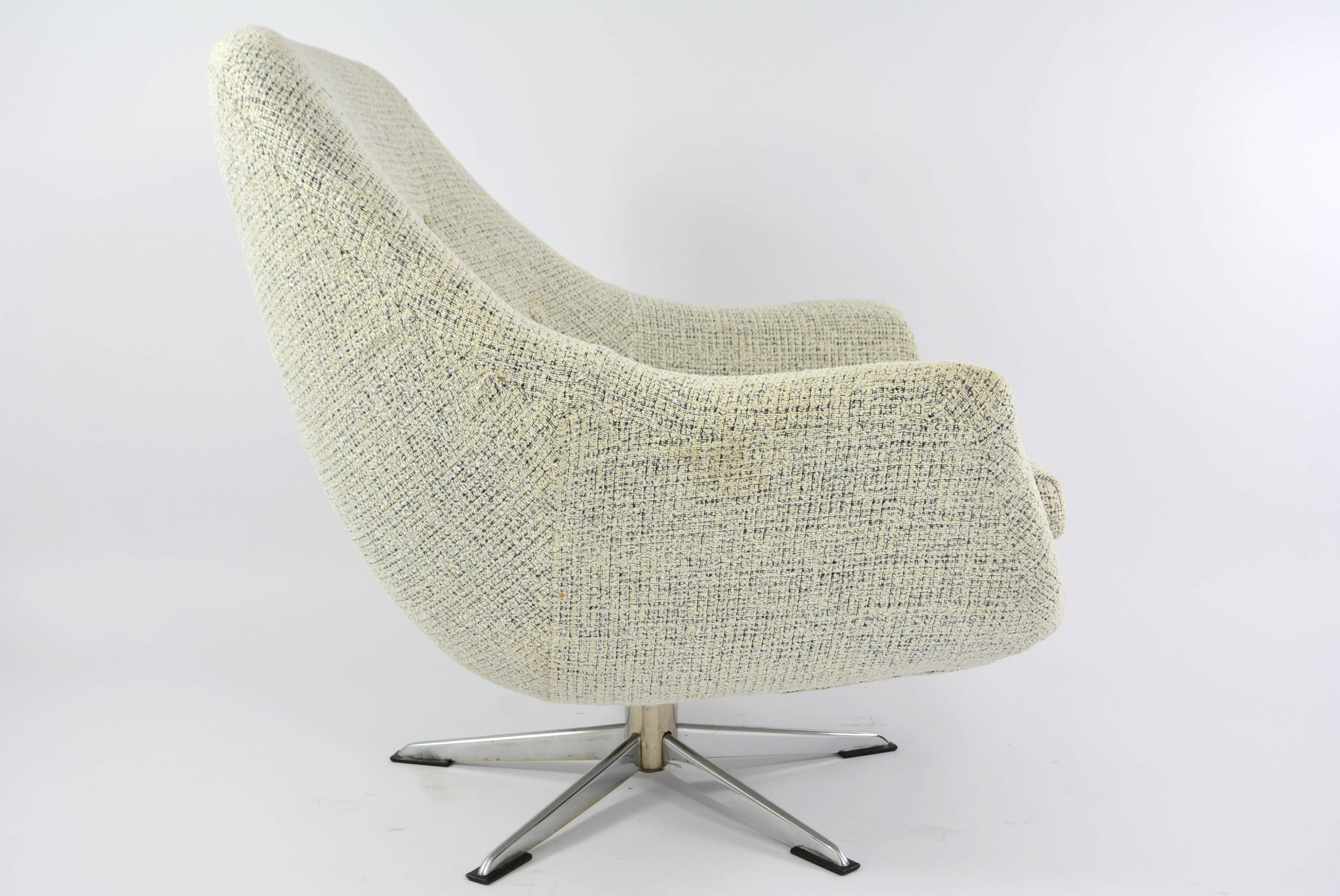 Swivel shell armchair