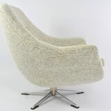 Swivel shell armchair