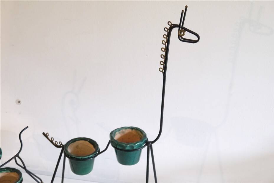 Pair of metal and ceramic plant stands