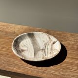 Tray, circular dish or plate made of white striped grey petrified wood.