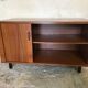 Vintage storage cabinet box on feet with sliding curtain