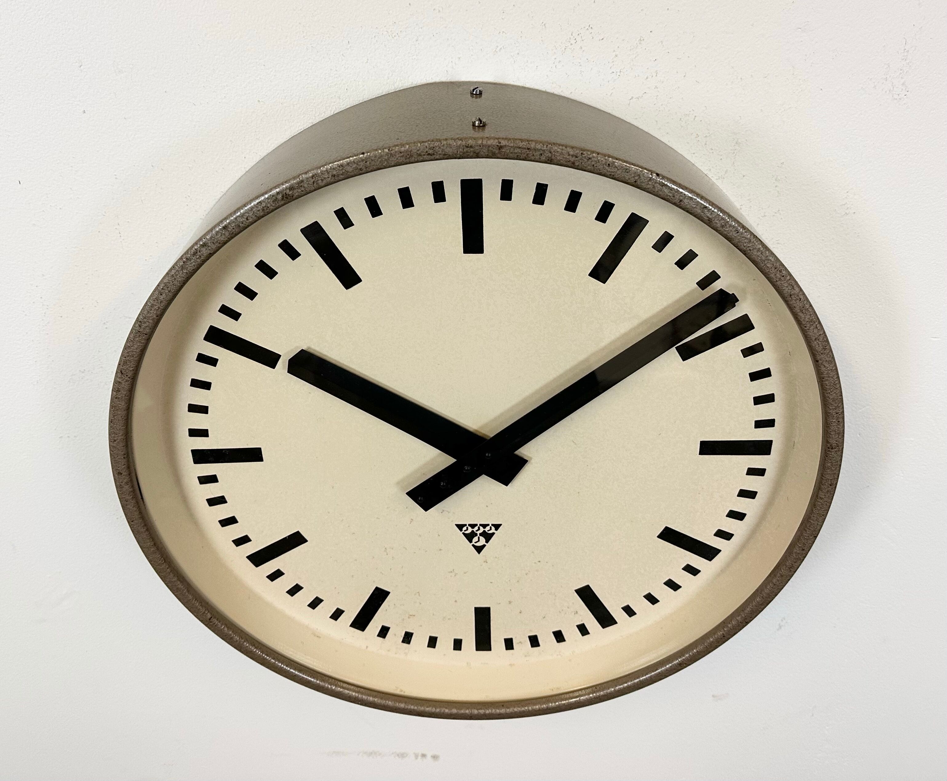 Brown industrial factory wall clock from Pragotron, 1960s