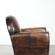 Armchair made of comfortable sheepskin leather in Art Deco design