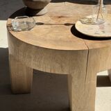 Petrified wood catchall or dish in beige with several grey spots in the centre.