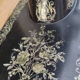 Old Singer sewing machine on pedestal